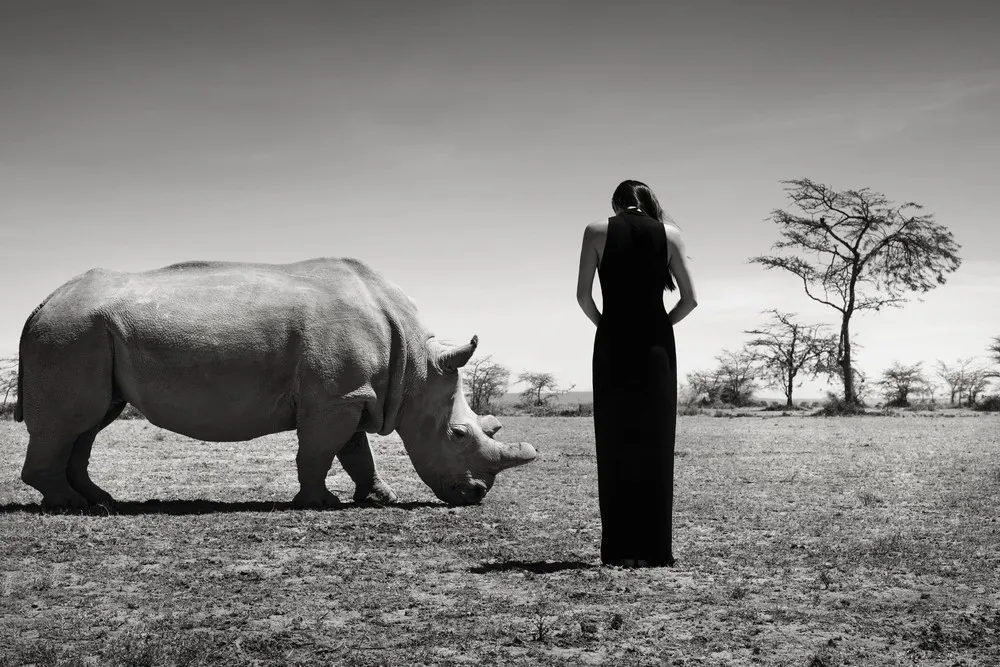 Models Pose with Endangered Animals