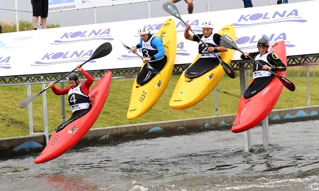Four canoeists on the track in the category of extreme K-1 during the World Cup in Wildwater Canoeing, taking place on the track in Krakow, Poland, on 1 July 2018. (Photo by Jacek Bednarczyk/EPA/EFE)