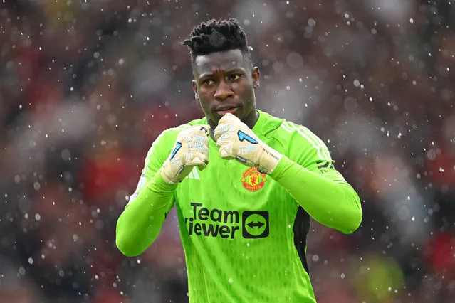 Andre Onana of Manchester United reacts as Christian Eriksen of Manchester United scores the team's first goal during the Premier League match between Manchester United and Nottingham Forest at Old Trafford on August 26, 2023 in Manchester, England. (Photo by Stu Forster/Getty Images)
