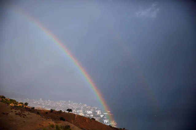 A rainbow is seen over the northern Israeli city of Tiberias, located near the Sea of Galilee December 1, 2016. (Photo by Ronen Zvulun/Reuters)