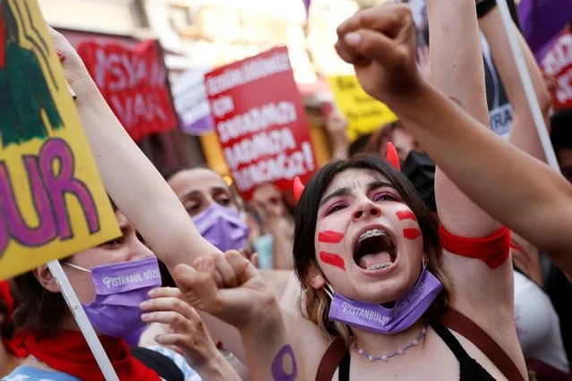 People participate in a protest against Turkey's withdrawal from the Istanbul Convention, an international accord designed to protect women, in Istanbul, Turkey, July 1, 2021. (Photo by Murad Sezer/Reuters)