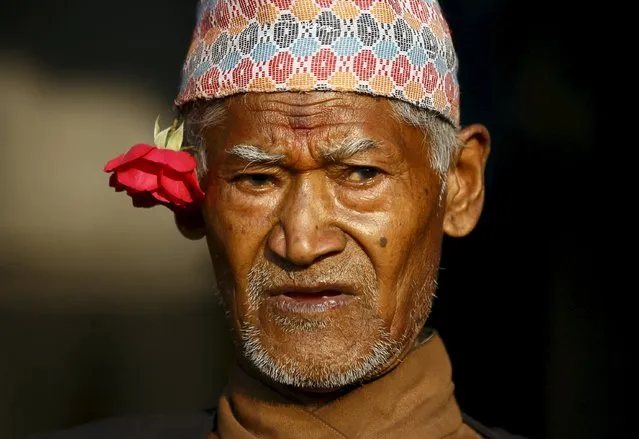 A man wearing a traditional Nepali cap takes part in the Bisket festival at Bhaktapur April 10, 2015. (Photo by Navesh Chitrakar/Reuters)