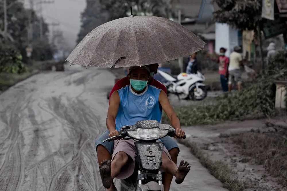 Indonesian Volcano Continues to Disrupt Life with Eruption