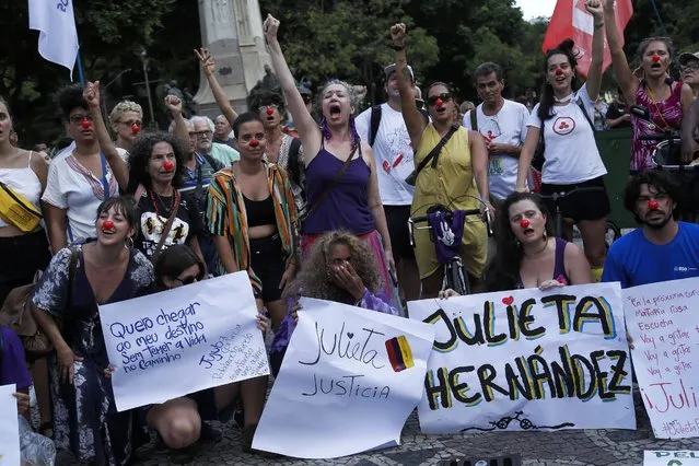 Artists protest violence against women after the murder of Venezuelan actress and clown Julieta Inés Hernández Martínez in Rio de Janeiro, Brazil, Monday, January 8, 2024. The body of Hernández, who had been missing since Dec. 23 while traveling by bicycle, was found in Presidente Figueiredo city, near Manaus in Amazonas state. (Photo by Bruna Prado/AP Photo)