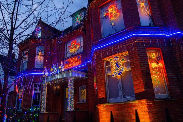 The front of a house in Wimbledon, United Kingdom decorated with Christmas lights on December 6, 2021. (Photo by Amer Ghazzal/Rex Features/Shutterstock)