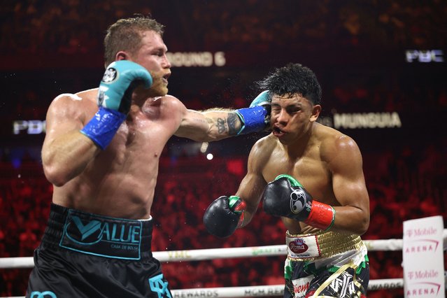 Canelo Alvarez lands a left against Jaime Munguia in their super middleweight championship title fight at T-Mobile Arena on May 04, 2024 in Las Vegas, Nevada. (Photo by Christian Petersen/Getty Images/AFP Photo)
