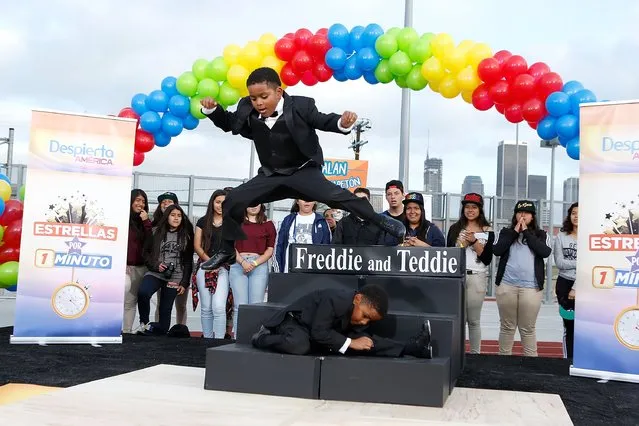 Freddy Tisdale and Teddy Tisdale attend Volunteer day for “Yo Soy Univision Contigo” at Para Los Ninos Charter Middle School on April 29, 2016 in Los Angeles, California.  (Photo by Randy Shropshire/Getty Images for Univision)