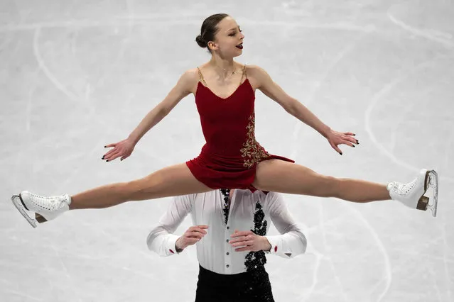 Aleksandra Boikova and Dmitrii Kozlovskii, of the Russian Olympic Committee, compete in the pairs free skate program during the figure skating competition at the 2022 Winter Olympics, Saturday, February 19, 2022, in Beijing. (Photo by Bernat Armangue/AP Photo)