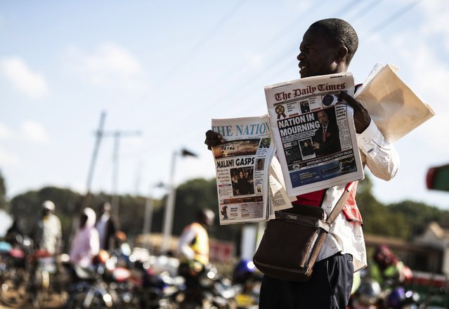 A vendor sells newspapers in Lilongwe, Malawi, Wednesday, June 12, 2024, following the death of Malawi's Vice President, Saulos Chilima, in a plane crash Monday. The Malawi government says that Chilima will be honored with a state funeral after he was killed along with eight other people in a plane crash. (Photo by Thoko Chikondi/AP Photo)