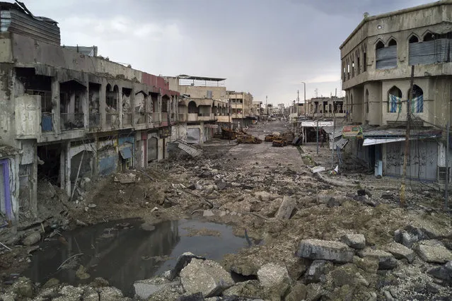 A neighborhood recently retaken by Iraqi security forces during fighting against Islamic State militants on the western side of Mosul, Iraq, Monday, April 3, 2017. (Photo by Felipe Dana/AP Photo)