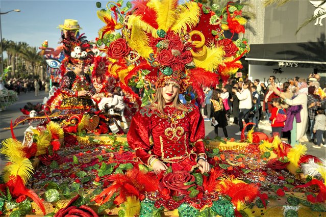 A participant dressed in colorful costume is seen during the 10th International Yasmine Hammamet Carnaval in Hammamet, Tunisia on March 18, 2023. (Photo by Yassine Gaidi/Anadolu Agency via Getty Images)