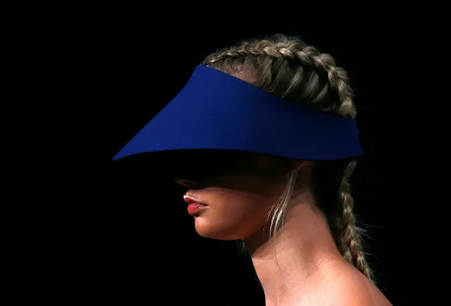 A model wears a hat as she presents a creation from the fashion label Bondi Bather during Australian Fashion week in Sydney, Australia, May 19, 2016. (Photo by David Gray/Reuters)