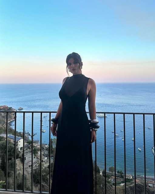 American actress and singer Bella Thorne takes in the sunset during the Taormina Film Festival in Italy in the second decade of July 2024. (Photo by bellathorne/Instagram)