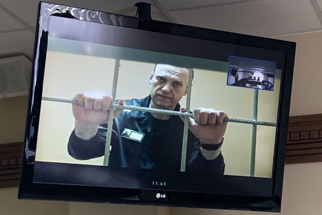 Russian opposition leader Alexei Navalny appears from prison on a video link provided by the Russian Federal Penitentiary Service, at a courtroom in Vladimir, Russia, Tuesday, June 7, 2022. A court in Vladimir region on Tuesday rejected an appeal of Russian opposition leader Alexei Navalny against the correctional colony's decision to label him “a person inclined to commit crimes of a terrorist or extremist nature”. (Photo by Vladimir Kondrashov/AP Photo)