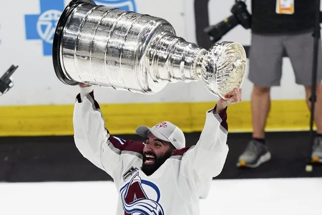Colorado Avalanche center Nazem Kadri lifts the Stanley Cup after the team defeated the Tampa Bay Lightning 2-1 in Game 6 of the NHL hockey Stanley Cup Finals on Sunday, June 26, 2022, in Tampa, Fla. (Photo by John Bazemore/AP Photo)