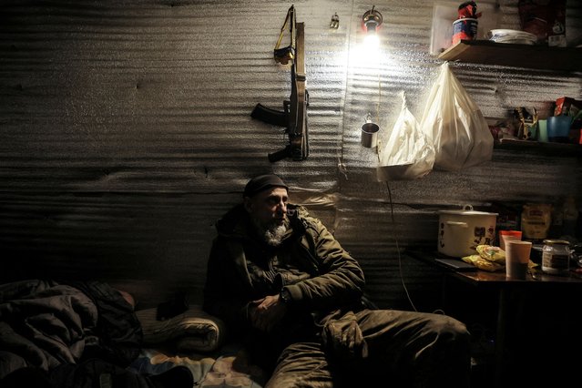 A serviceman of 24th Mechanized brigade named after King Danylo of the Ukrainian Armed Forces rests at his frontline position, near the town of Chasiv Yar in Donetsk region, Ukraine on February 9, 2025. (Photo by Oleg Petrasiuk/Ukrainian Armed Forces)
