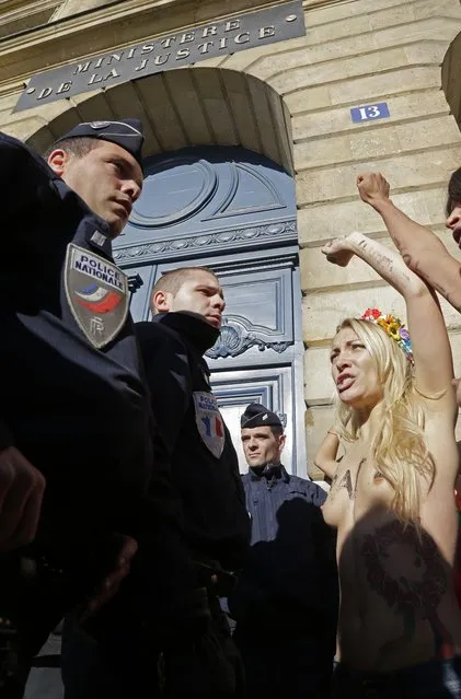 Topless FEMEN Activists Attempt French Justice Ministry Break-In