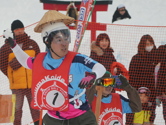 A man throws a snowball at the 35th Koide International Snowball Fight in Uonuma, Niigata Prefecture, Japan, on February 9, 2025. (Photo by Tom Bateman/Reuters)