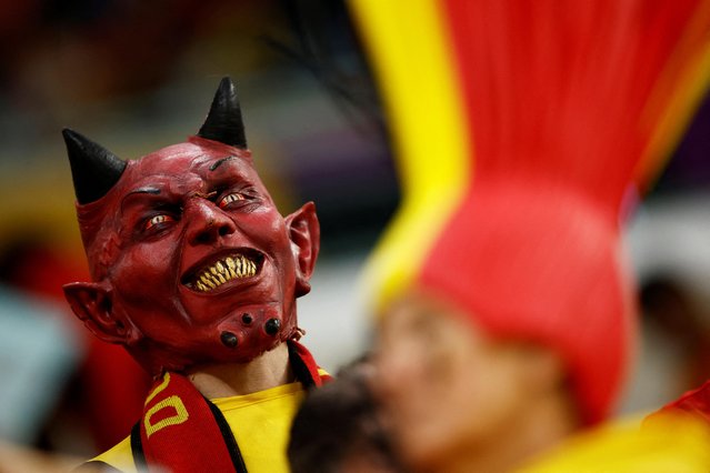 Belgium fan wears a devil mask attends the Qatar 2022 World Cup Group F football match between Croatia and Belgium at the Ahmad Bin Ali Stadium in Al-Rayyan, west of Doha on December 1, 2022. (Photo by Stephane Mahe/Reuters)
