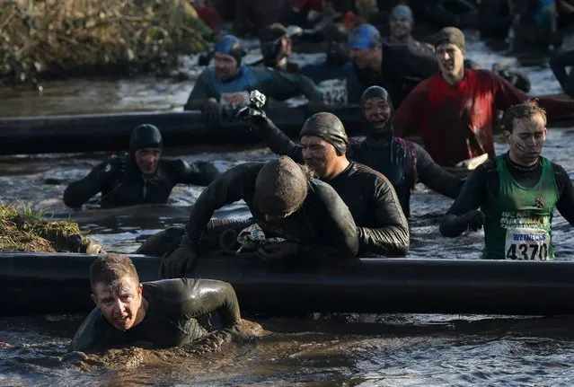 CCompetitors in action during the Tough Guy Challenge on January 27, 2013 in Telford, England.  (Photo by Ian Walton)