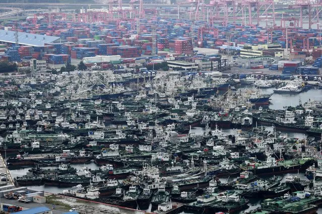 Ships are anchored at a port in Busan, South Korea, Sunday, September 6, 2020. South Korea's weather agency said Typhoon Haishen was expected to skirt the Korean Peninsula's east coast on Monday with heavy rains and strong winds. (Photo by Son Hyung-ju/Yonhap via AP Photo)