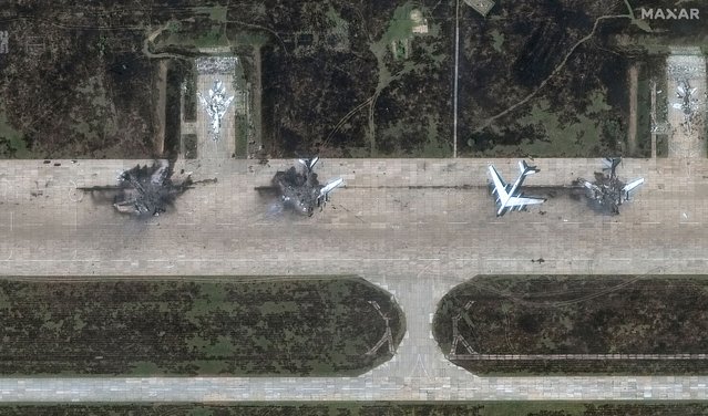 A satellite image shows a destroyed Tupolev Tu-95 aircraft at the Belaya airbase near Usolye-Sibirskoye in the Irkutsk oblast, Russia on June 4, 2025. Ukraine launched a drone attack against Russian military bombers in Siberia, striking more than 40 warplanes thousands of miles from Ukrainian territory after it smuggled the drones, hidden in the roofs of wooden sheds, to the perimeter of the airfields. (Photo by Maxar Technologies/EPA)