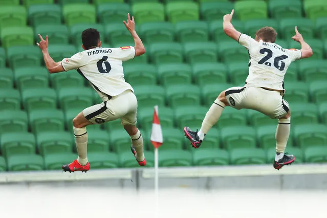 Louis D'Arrigo of Adelaide United (L) celebrates his goal during the round 16 A-League Men's match between Western United and Adelaide United at AAMI Park on February 11, 2023 in Melbourne, Australia. (Photo by Graham Denholm/Getty Images)