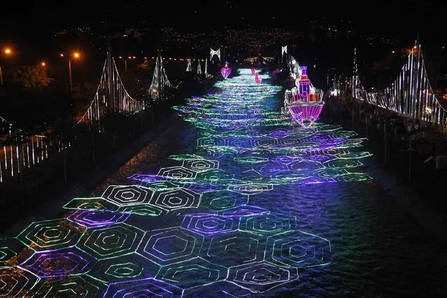 Christmas decorations light up the Medellin river in Medellin, Colombia, December 10, 2014. (Photo by Fredy Builes/Reuters)