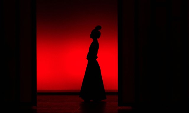 A dancer performs during a dress rehearsal for the Hong Kong Ballet's production of “The Butterfly Lovers” at the Lincoln Center's David H. Koch Theater in New York on August 21, 2025. (Photo by Timothy A. Clary/AFP Photo)