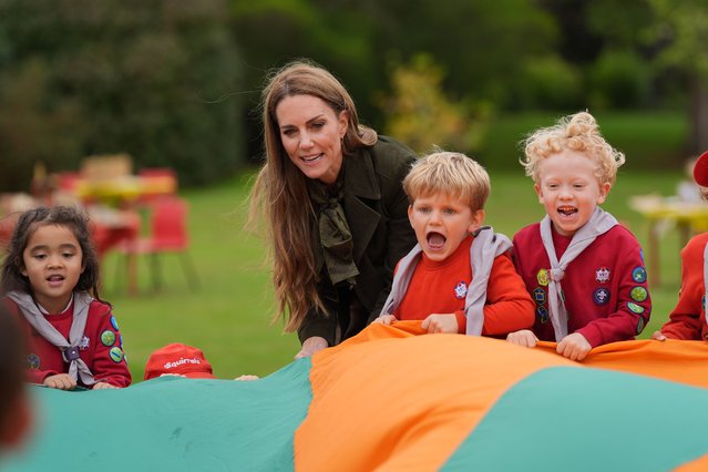 Catherine, Princess of Wales plays a game as she meets members of the Scouts' Squirrels programme in Frogmore Gardensduring the State visit by the President of the United States of America and U.S. First Lady Melania Trump, on September 18, 2025 in Windsor, England. (Photo by Yui Mok – WPA Pool/Getty Images)