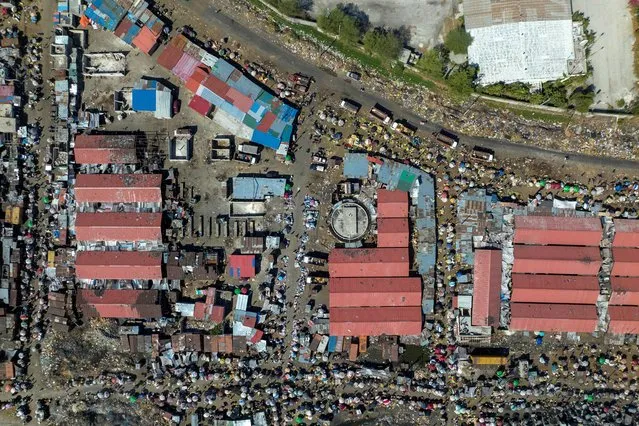 Aerial view of the Solidarite Market in La Saline days after Haiti police blocked streets and broke into the airport during a protest demanding justice for fellow police officers killed by armed gangs, in Port-au-Prince, Haiti on January 30,2023. (Photo by Ricardo Arduengo/Reuters)