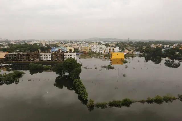 An aerial view shows a flooded residential colony in Chennai, India, December 6, 2015. (Photo by Anindito Mukherjee/Reuters)