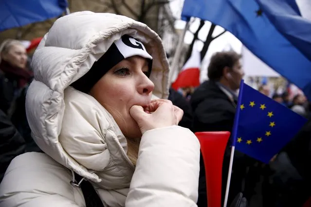 A woman whistles during an anti-government demonstration in front of the Constitutional Court in Warsaw, Poland December 12, 2015. (Photo by Kacper Pempel/Reuters)