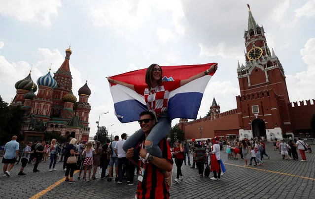 Croatia gather in Red Square in central Moscow on July 15, 2018 before the final match between Croatia and France during the Russia 2018 World Cup football tournament. (Photo by Gleb Garanich/Reuters)