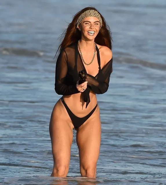 English actress Jennifer Metcalfe looked incredible as she flashed her bum in a thong bikini on the beach. The actress, 39, showed off her amazing figure in a daring black two-piece while soaking up the sun during her Spanish getaway in the second decade of June 2023. (Photo by Backgrid UK)