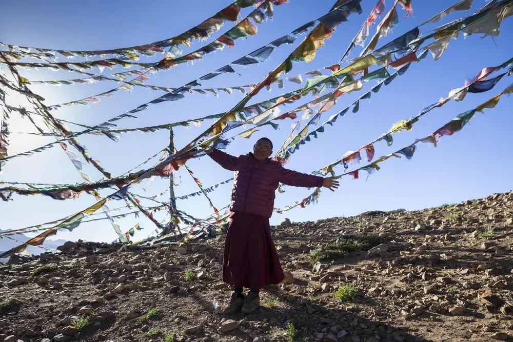 Buddhist Monks in the Himalayas get ready for Winter