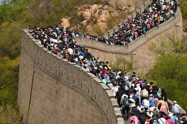 People visit the Great Wall during the labour day holiday in Beijing on May 1, 2021. (Photo by Noel Celis/AFP Photo)