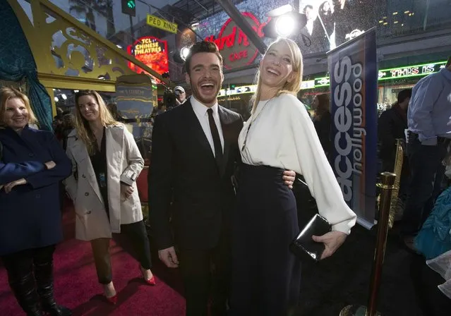 Cast members Richard Madden and Cate Blanchett pose at the premiere of "Cinderella" at El Capitan theatre in Hollywood, California March 1, 2015. The movie opens in the U.S. on March 13. REUTERS/Mario Anzuoni  (UNITED STATES - Tags: ENTERTAINMENT)