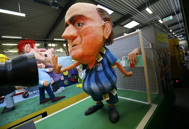 A papier mache caricature figure for a carnival float depicting suspended FIFA president Sepp Blatter is prepared for the upcoming Rose Monday carnival parade in Cologne, Germany February 2, 2016. (Photo by Wolfgang Rattay/Reuters)