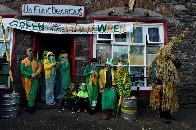 Costumed participants are seen during an Irish tradition of Hunting of the Wren festival held every St. Stephen's Day in Dingle, Ireland December 26, 2016. (Photo by Clodagh Kilcoyne/Reuters)