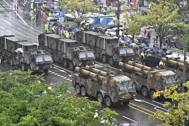 Hyunmoo-3 vehicles (front) take part in a military parade to celebrate South Korea's 75th Armed Forces Day in Seoul on September 26, 2023. (Photo by Anthony Wallace/AFP Photo)