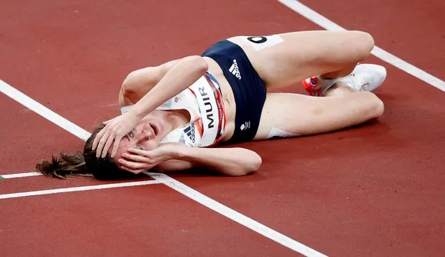 Second-placed Britain's Laura Muir reacts after competing in the women's 1500m final during the Tokyo 2020 Olympic Games at the Olympic Stadium in Tokyo on August 6, 2021. (Photo by Phil Noble/Reuters)