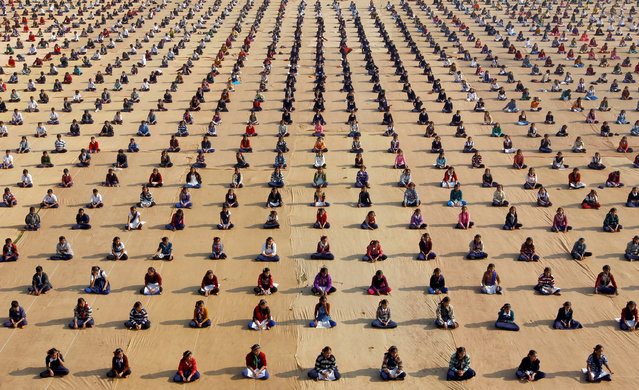 Schoolchildren attend a yoga session at a camp in Ahmedabad, India January 5, 2017. (Photo by Amit Dave/Reuters)
