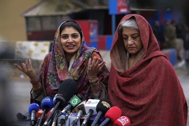 Gauhar Bano Qureshi, left, daughter, and Mehriene Qureshi, wife of Shah Mahmood Qureshi, a deputy leader of Pakistan's former Prime Minister Imran Khan's “Pakistan Tehreek-e-Insaf” party, speak with media following a special court decision, outside the Adiyala prison, in Rawalpindi, Pakistan, Tuesday, January 30, 2024. A Pakistani court on Tuesday sentenced former Prime Minister Khan and one of his party deputy Qureshi to 10 years in prison each, after finding them guilty of revealing official secrets. (Photo by Anjum Naveed/AP Photo)