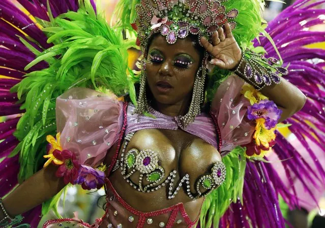 A reveller of the Mangueira samba school participates in the annual Carnival parade in Rio de Janeiro's Sambadrome, March 3, 2014. (Photo by Sergio Moraes/Reuters)