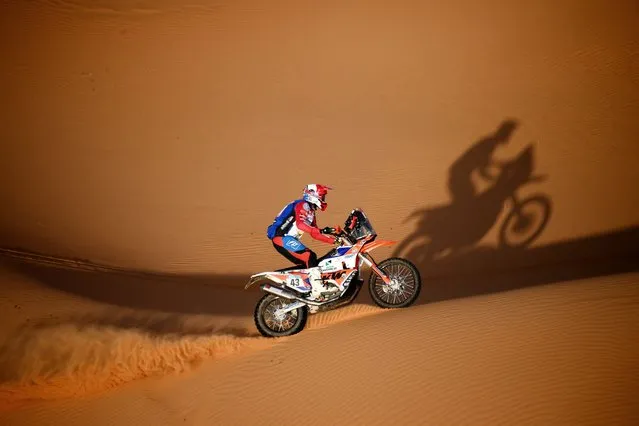 US biker Mason Klein competes during Stage 7 of the Dakar Rally 2022 between the Saudi capital Riyadh and al-Dawadimi town, on January 9, 2022. (Photo by Franck Fife/AFP Photo)