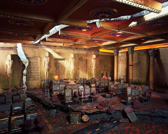 Casino, 2013. “Time and Mother Nature become the great equalizer in these deserted spaces”, Nix said. “Grand cultural chambers acquire the same gritty patina as the local laundromat or industrial control room”. (Photo by Lori Nix)
