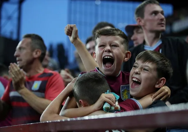 Aston Villa fans celebrate their first goal against Everton in Birmingham, Britain, August 23, 2019. (Photo by Carl Recine/Action Images via Reuters)