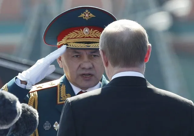 Russian President Vladimir Putin (R) and Defence Minister Sergei Shoigu attend the Victory Day parade, marking the 71st anniversary of the victory over Nazi Germany in World War Two, at Red Square in Moscow, Russia, May 9, 2016. (Photo by Grigory Dukor/Reuters)