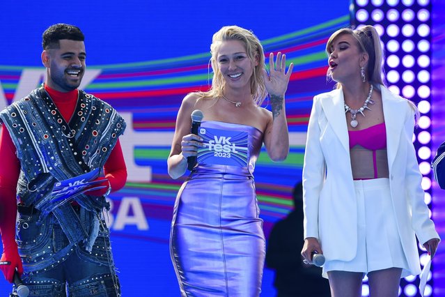 Russian TV presenter and actress Anastasia Ivleeva, center, perform during VK Festival in Moscow, Russia, on July 15, 2023. A Moscow court on Thursday imposed a 50,000-ruble ($560) fine for discrediting the military on Anastasia Ivleeva, a TV presenter and actress whose party for scantily clad guests sparked an explosion of public indignation in the increasingly traditionalist country. (Photo by AP Photo, File)
